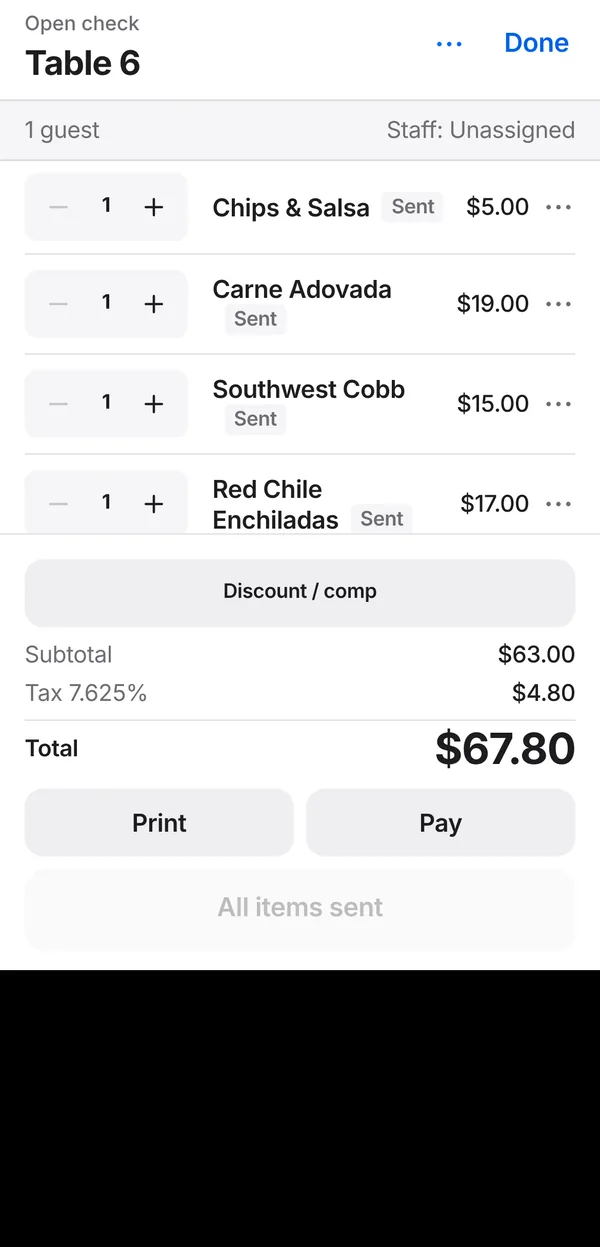 Open check for Table 6 on an iPhone with subtotal, tax and total